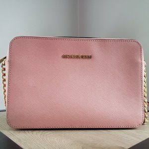 Pink Michael Kors cross body bag